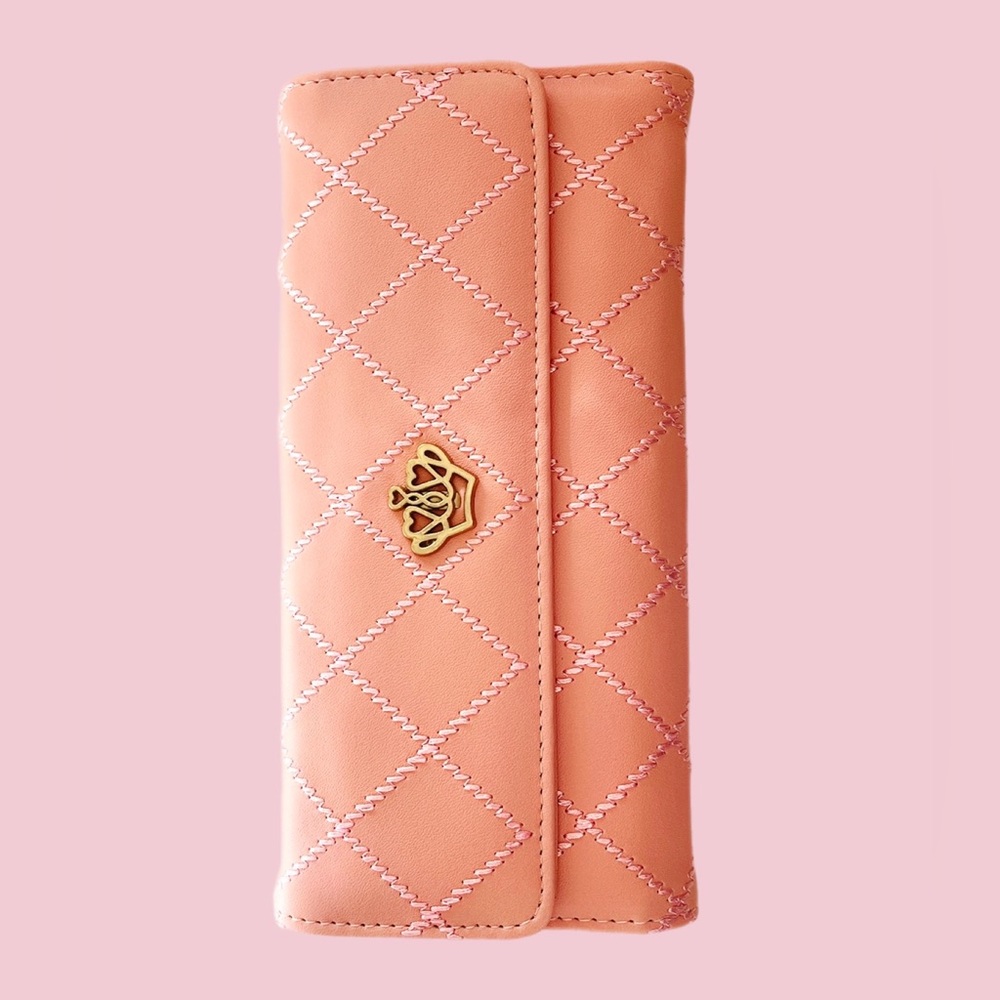 Pastel pink wallet with gold crown